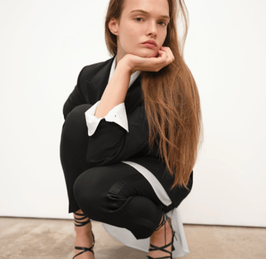 Photo from Awkward Zara, of model in strange crouching pose