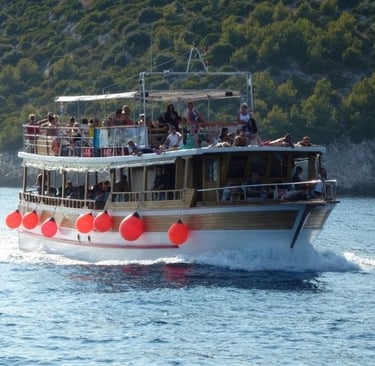 The picture shows tourists on a day trip boat.
