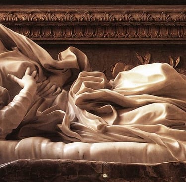 a statue of a woman in a chair