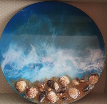a decorative plate with shells and shells on it