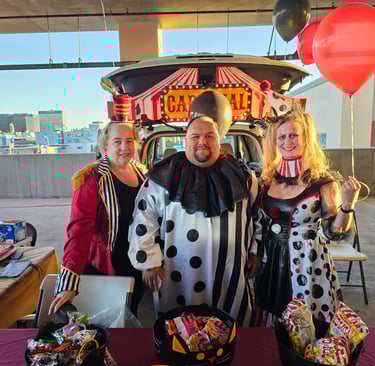 Jiffy Lube employees set up a booth for the Boys and Girls Club for Halloween