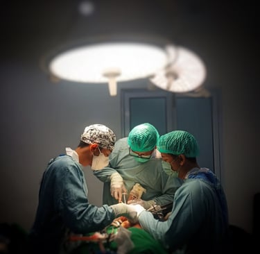 a group of surgeons performing surgery in a hospital