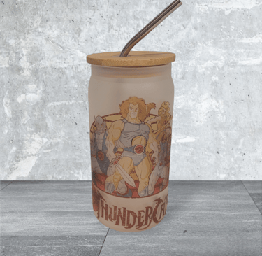 a glass tumbler with a straw