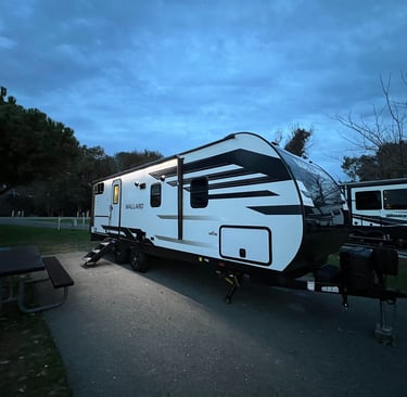 heartland mallart travel trailer at dusk