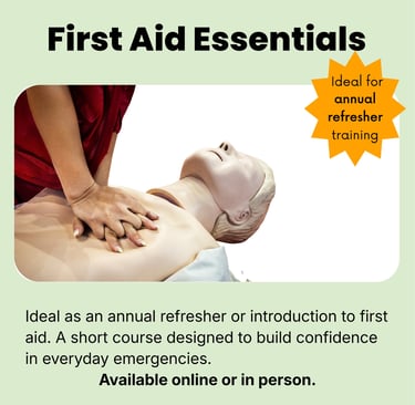 Someone learning CPR on a training manikin. Hands interlinked providing chest compressions