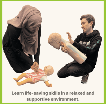 People learning how to help someone who is choking with first aid training manikins