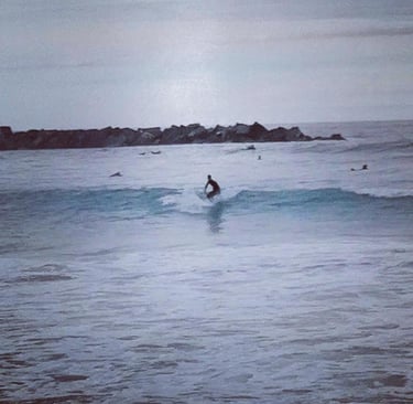 A surfer riding a wave.