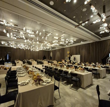 event space decorated with long table and flowers