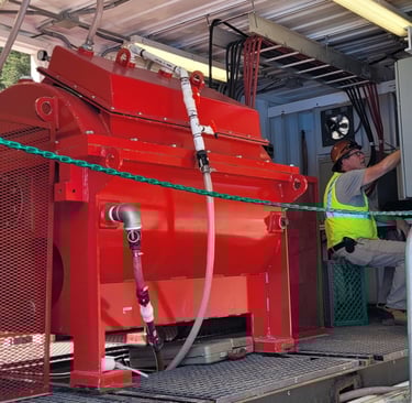 An Avivid team member sitting near the Turbocoag, working on the Nelson Tunnel site in CO.