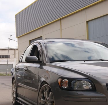 a car parked in front of a building