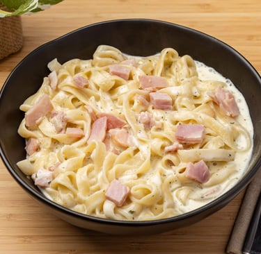 Fettuccine Carbonara Kenwick with creamy sauce and bacon at Bingo Bites