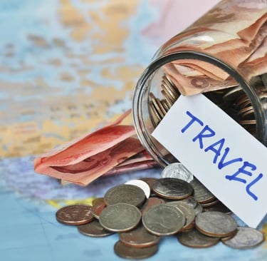 a jar of coins and a travel tag on a map of the world