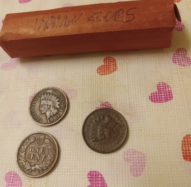 Roll of wheat pennies with Indian Ends, three Indian head pennies 