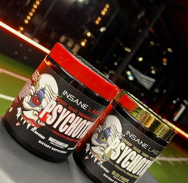 Two tubs of Insane Labz Psychotic high-stimulant pre-workout supplement in Watermelon and Blue Punch flavors.