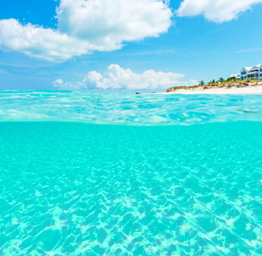 Grace Bay Beach in Turks and Caicos with crystal-clear turquoise water and white sand