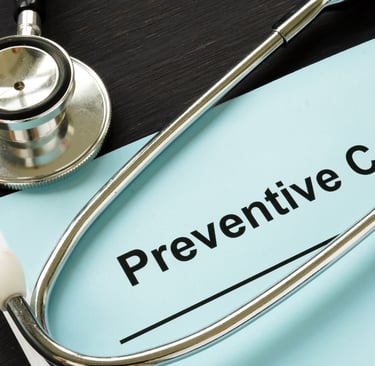 Paper and stethoscope  saying Preventive Care