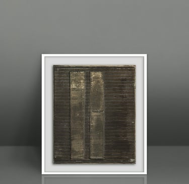 Framed gold and black abstract textured wall art featuring vertical metallic bands on a ribbed background.