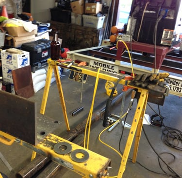 some random fabrication in an automotive shop, onsite for a customer