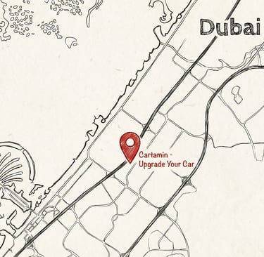 A minimalist street map of Dubai featuring a red location pin for Cartamin - Upgrade Your Car near Palm Jumeirah.