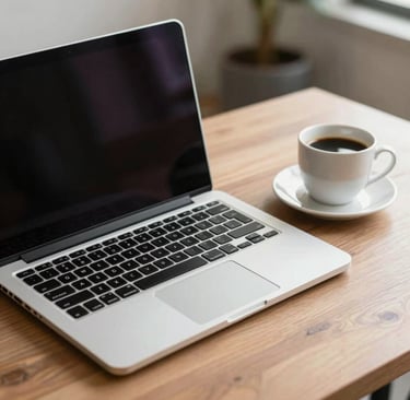 Modern office workspace with a laptop and a cup of coffee, symbolizing professional consulting.