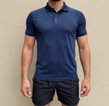 Close-up of a sleek black and red sports t-shirt fabric texture highlighting breathable mesh panels.