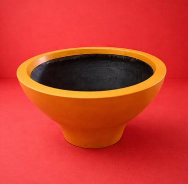maceta naranja circular en fibra de vidrio
