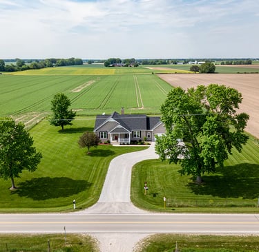 country home surrounded by farm land