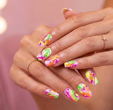 Ombre rainbow nail design with smooth colorful gradient and glossy finish