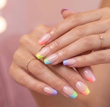 Colorful rainbow French tip nail design with glossy finish on stylish almond shaped nails