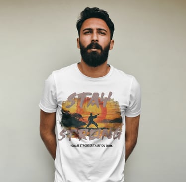 Man wearing stay strong tshirt created by young creator and neurodivergent artist