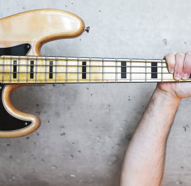 Triumphant bass player at Bass by Ear bass guitar lessons