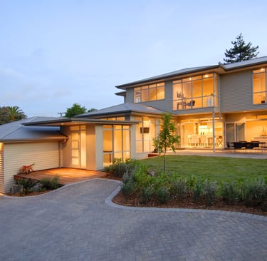 new modern 70's style timber weatherboard and longrun steel roof