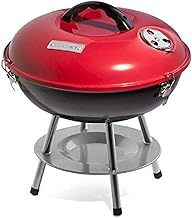 A portable red Cuisinart charcoal grill for tabletop outdoor cooking and camping.