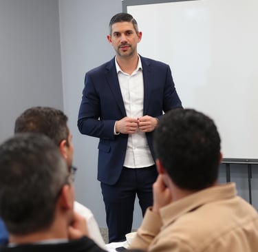 Miami attorney Adam Bair conducting a corporate training session on PowerPoint Slide Design