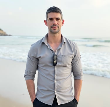 Adam Bair, wellness advocate and Miami resident, standing on the beach in South Florida