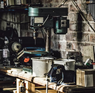 Garage with tools, bottles, pots
