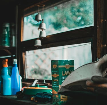 Shed with lawn feed, dustpan, window, sprays and bell mobile