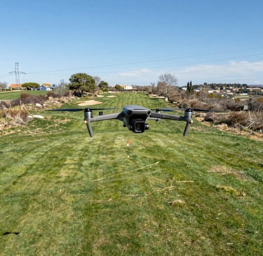 Wingtra Ray drone preparing for a flight over a large agricultural field.