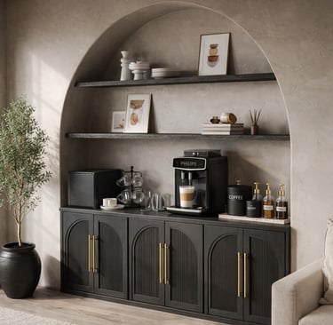 Modern home coffee station with black Philips espresso machine on a dark wood sideboard in an arched alcove.