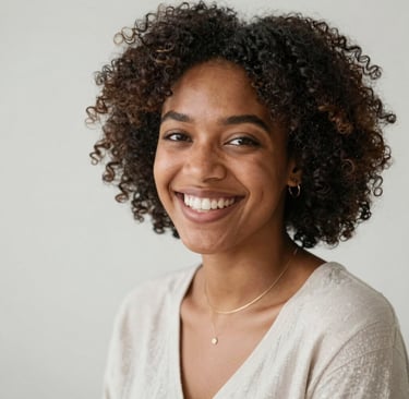 Close-up of an African woman enjoying a soothing facial treatment with a serene expression