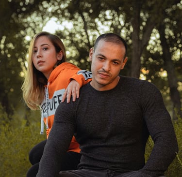 A man pulling away from his girlfriend