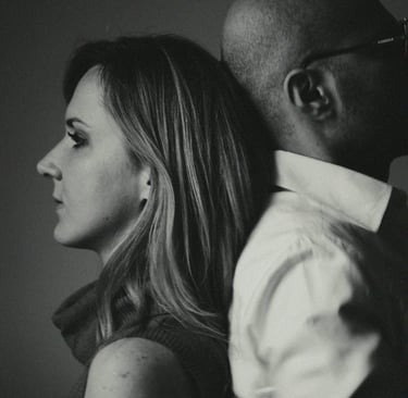 A woman in a romantic relationship with a man and asking the question "what to men want?"