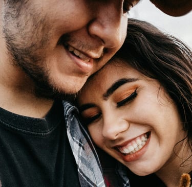woman and man sharing a genuine moment of deep connection and love