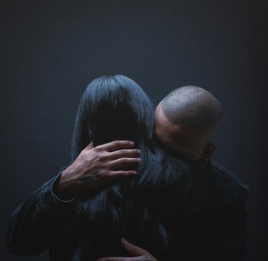 man and woman embracing to show understanding and closeness