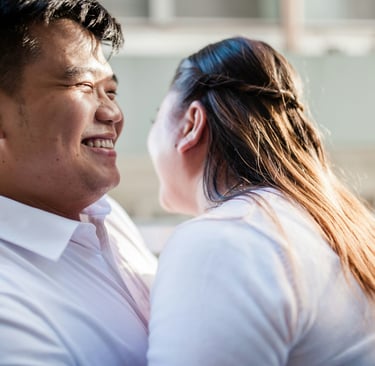 man looking at woman with obvious love and warmth in a quiet moment together
