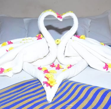 Romantic swan towel decoration room in Thirukadaiyur hotel