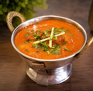 Vindaloo servido no Namastey India, prato indiano de Goa com molho intenso, especiarias aromáticas e