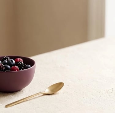 A minimalist and calming sand and plum-colored background featuring brain-healthy berries.