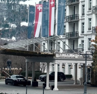 Grand Resort Bad Ragaz with Swiss and Liechtenstein flags symbolizing stability, discipline and long