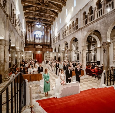 The photo shows a glorious wedding ceremony in Zadar Cathedral.